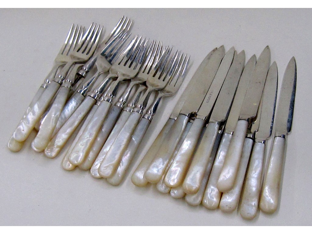 Appraisal: Silver and mother of pearl handled piece fruit cutlery set