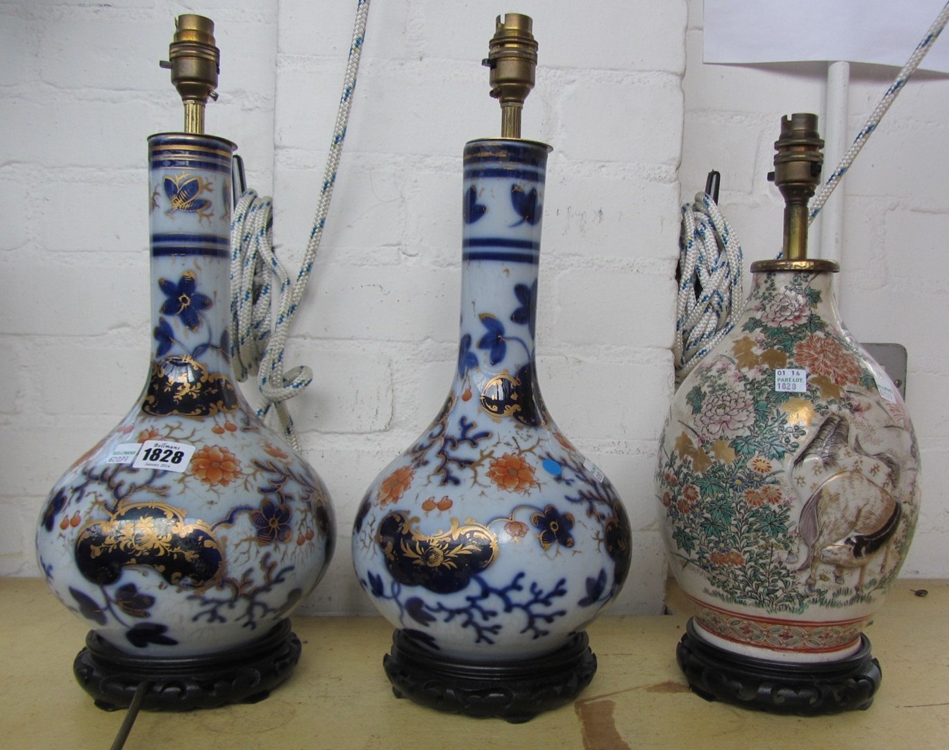 Appraisal: A pair of imari decorated lamp base vases of bottle