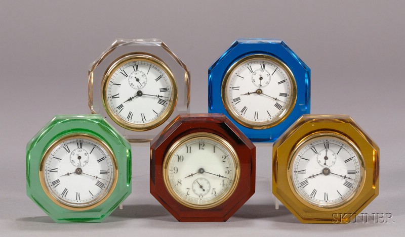 Appraisal: Five Glass Paperweight Clocks By E N Welch Manufacturing Company