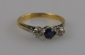 Appraisal: Three stone diamond and sapphire ring white and yellow gold