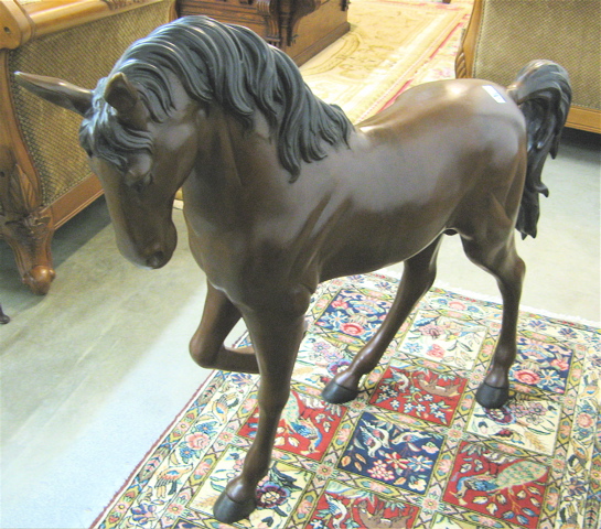 Appraisal: A LARGE EQUESTRIAN BRONZE FLOOR SCULPTURE the study of a