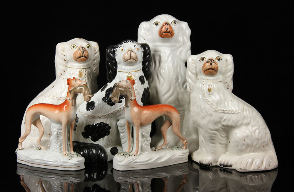 Appraisal: - Staffordshire Dog Figurines Lot of six Staffordshire dog figurines