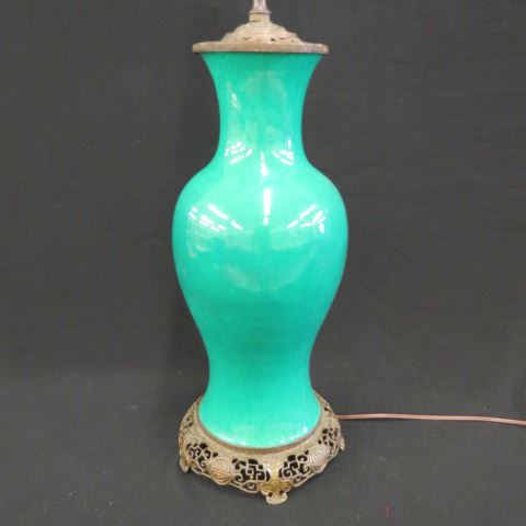 Appraisal: Chinese Green Glazed Pottery Lamp bronzed openwork fittings body excellent