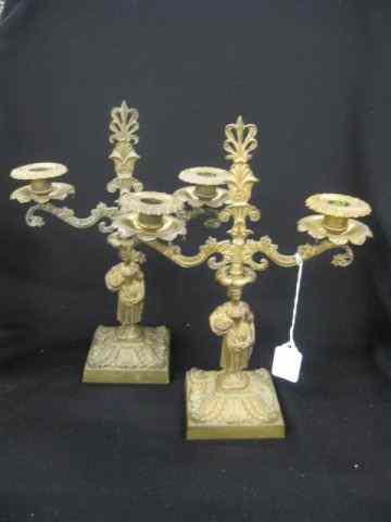 Appraisal: Pair of Victorian French Bronze Candelabra lady with basket of