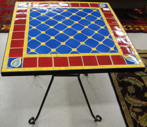 Appraisal: TILE-TOP CAFE TABLE the square top inset with red blue