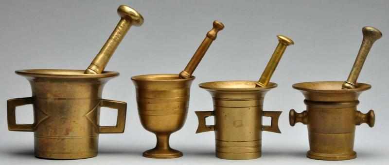 Appraisal: Lot of Brass Mortars Pestles Description Circa to Two brass