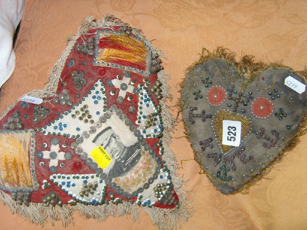 Appraisal: An early th century heart shaped red velvet pin cushion