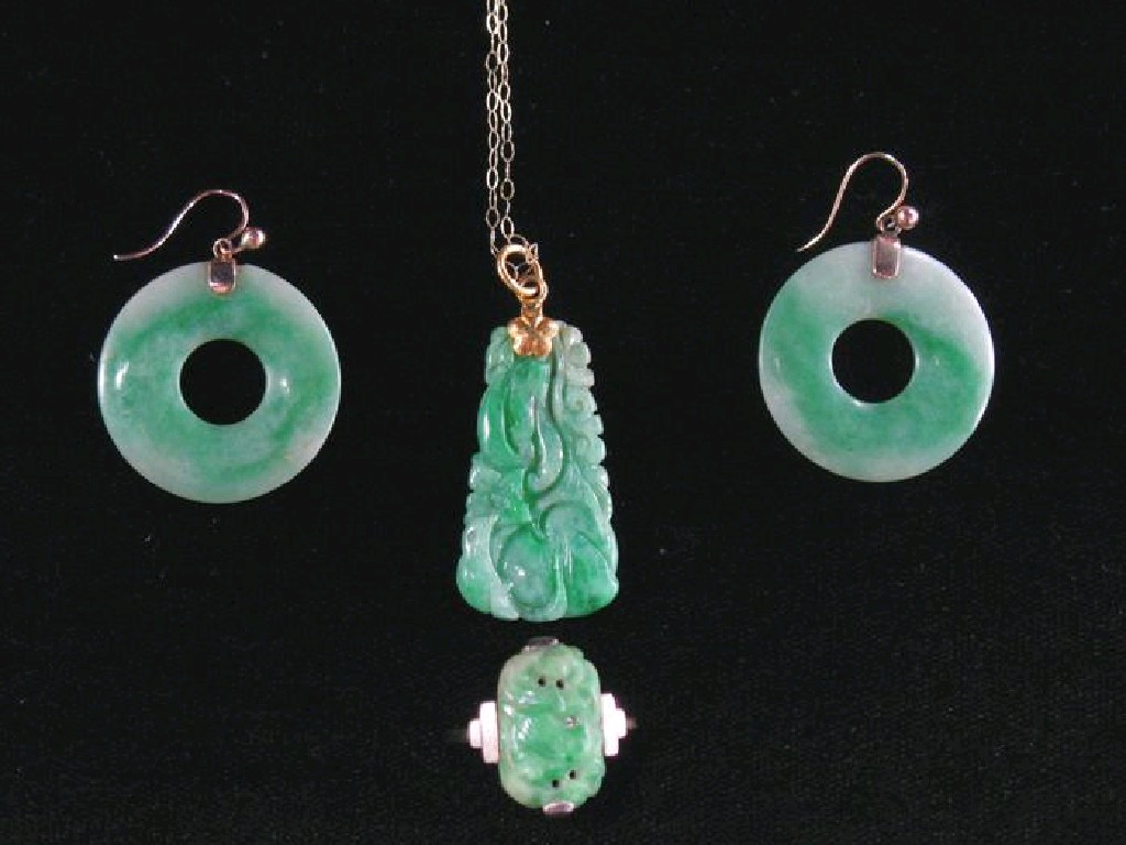 Appraisal: A PAIR OF GREEN JADEITE CIRCULAR EARRINGS with yellow metal