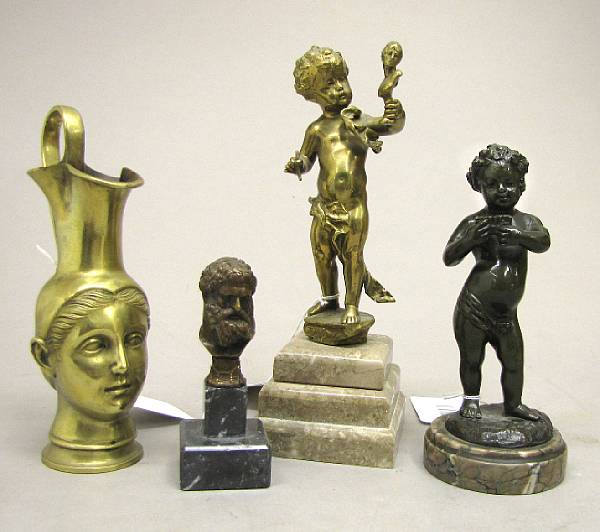 Appraisal: Four bronzes th century Comprising infant bacchant with pan pipes