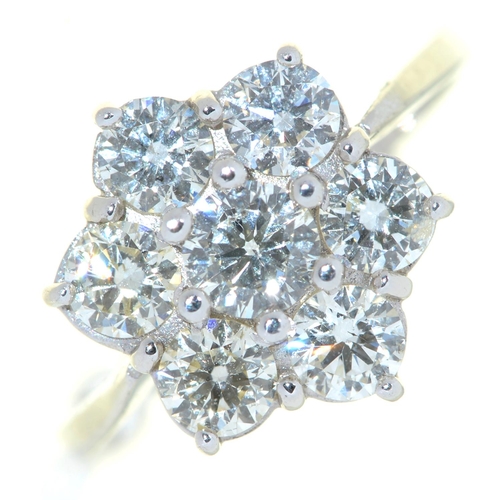 Appraisal: A diamond cluster ring with eight round brilliant cut diamonds