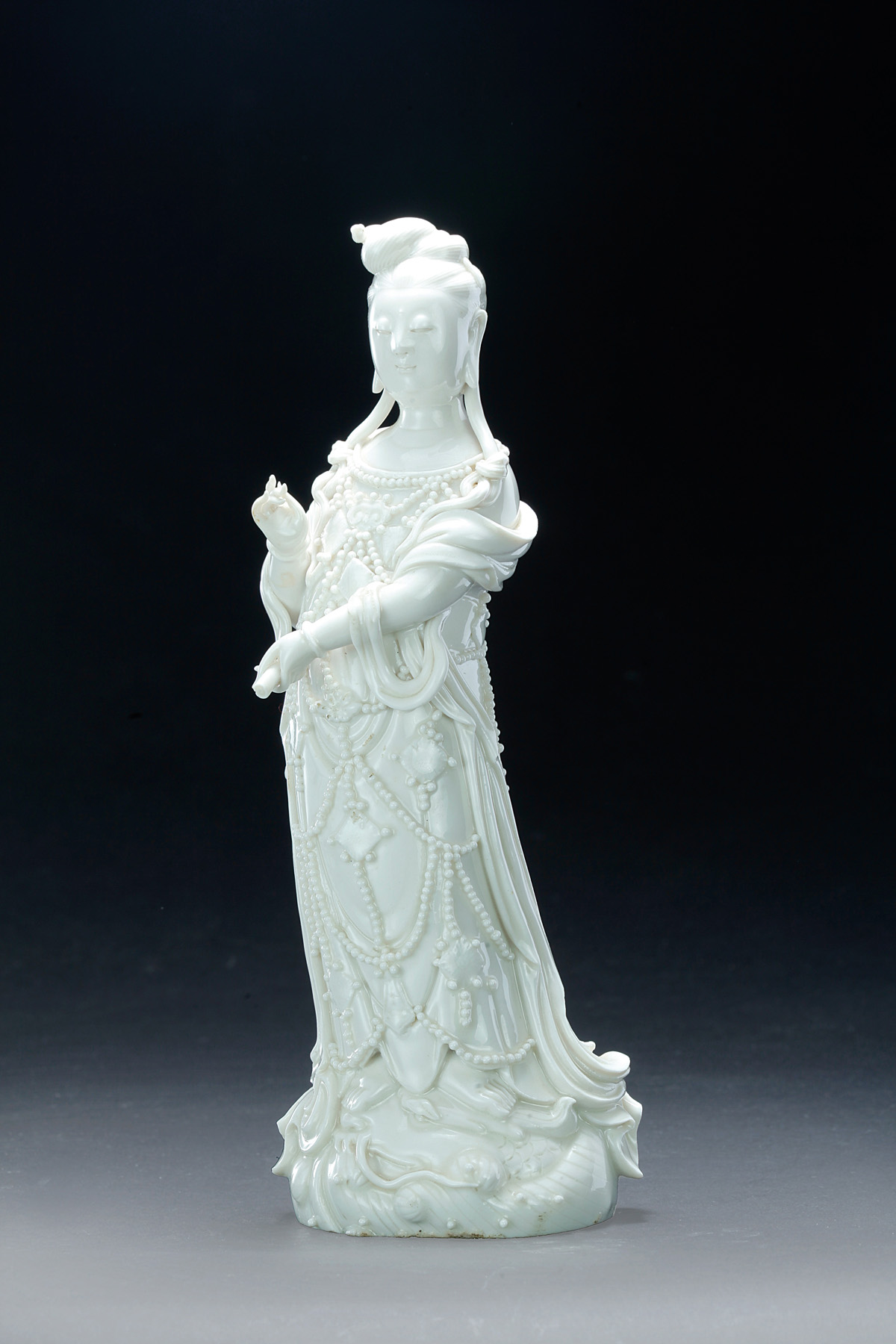 Appraisal: CHINESE DEHUA CERAMIC BUDDHA GUAN YIN Nineteenth century Blanc de