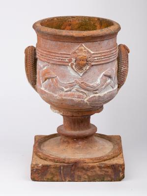 Appraisal: A decorative terracotta jardini re early th Century of urn