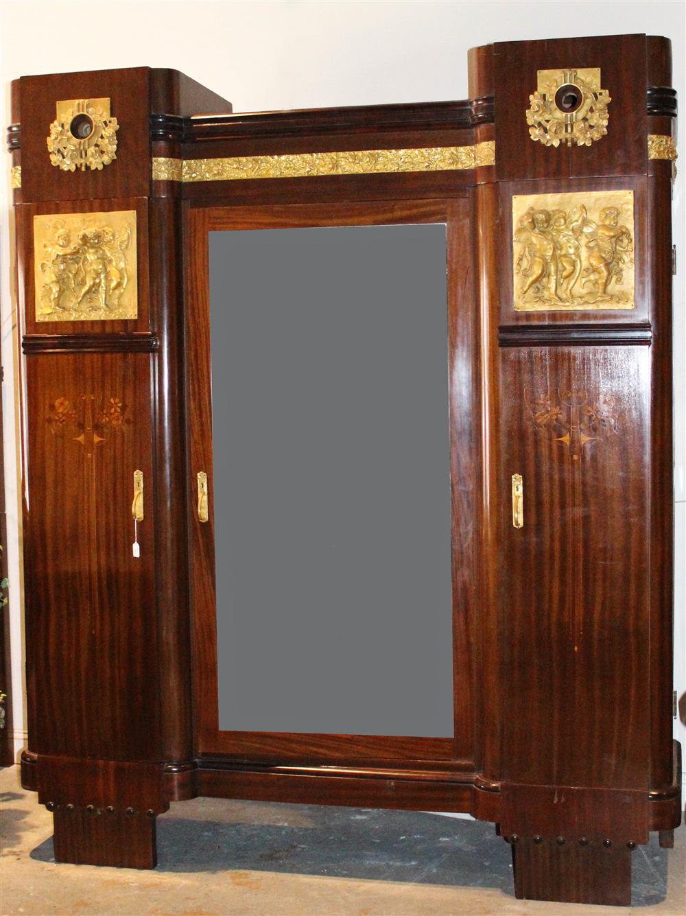 Appraisal: ART DECO GILT BRONZE MOUNTED MAHOGANY ARMOIRE CIRCA EN SUITE