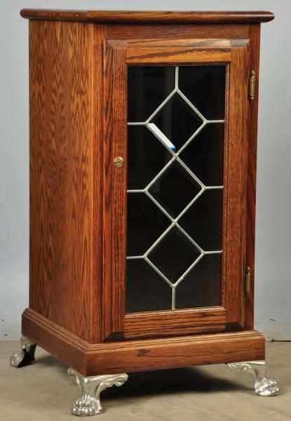 Appraisal: Oak Slot Machine Stand Description With iron claw feet and