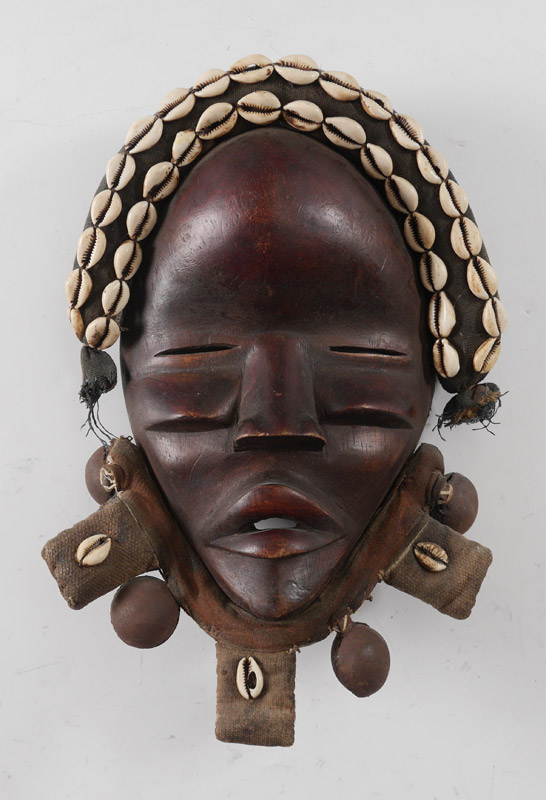 Appraisal: DECORATED CARVED DAN TRIBE AFRICAN MASK Carved mask with applied