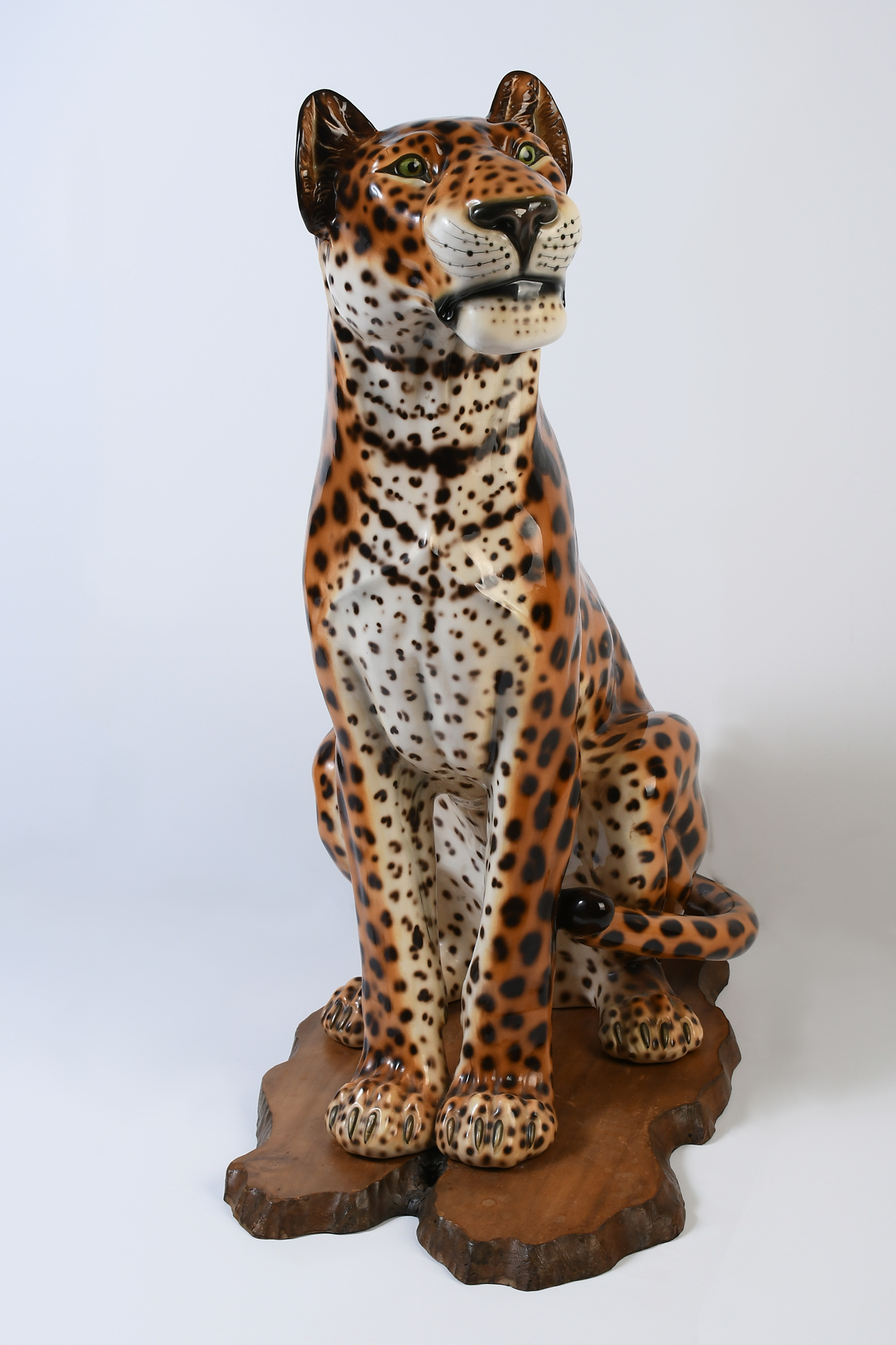 Appraisal: NEARLY LIFESIZE LEOPARD CERAMIC SCULPTURE Seated Leopard with Custom Wooden