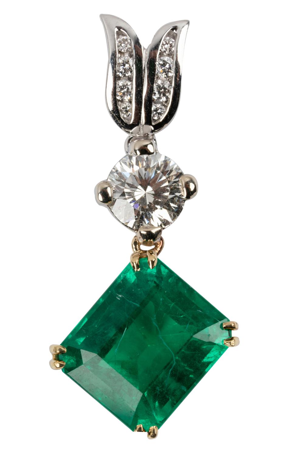 Appraisal: KARAT GOLD DIAMOND EMERALD PENDANTcontaining one octagonal step cut natural