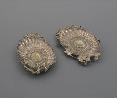 Appraisal: A pair of Oriental parcel-gilt small dishes or rests each