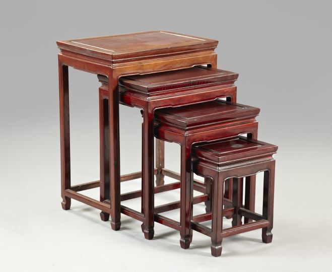 Appraisal: Nest of Four Oriental Teakwood Stacking Tables early th century