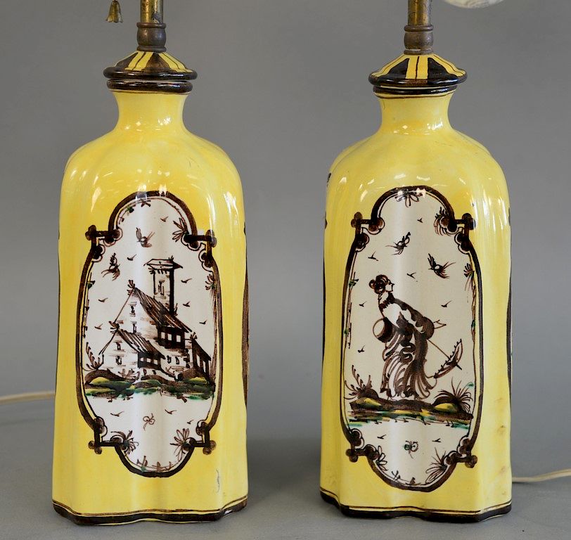 Appraisal: Pair of Italian yellow and manganese decorated bottles now mounted