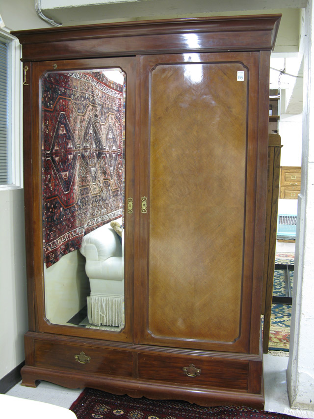 Appraisal: MAHOGANY DOUBLE-DOOR WARDROBE Harmen Pander Son Netherlands with molded flat-top