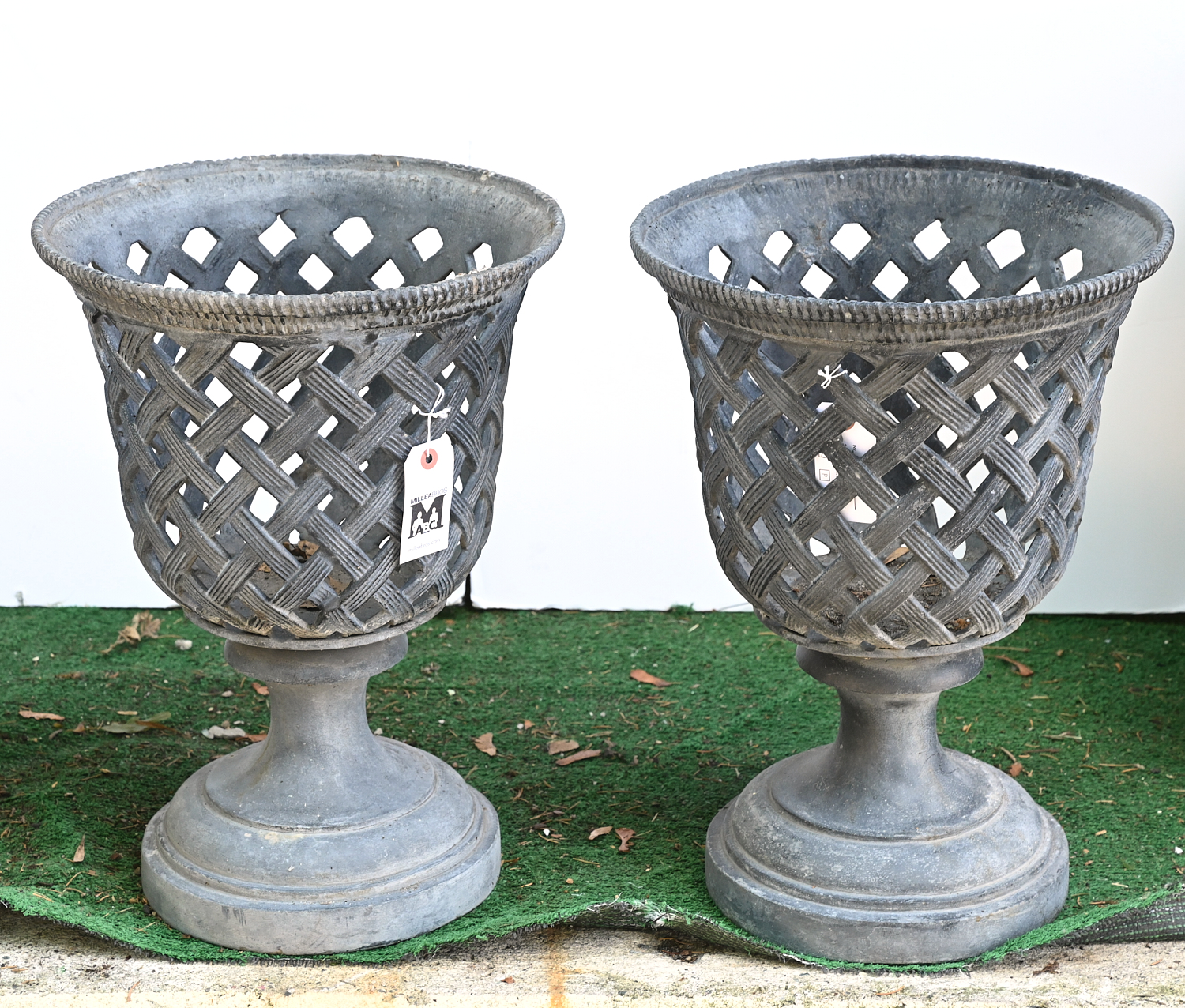 Appraisal: REGENCY STYLE LEAD GARDEN URNS th c Neo-Classical style pierced