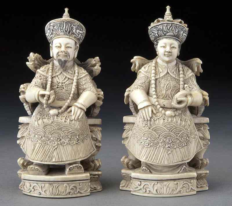 Appraisal: Pr Chinese carved ivory Emperor and Empress International shipping IS