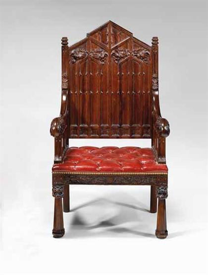 Appraisal: Carved and upholstered walnut Gothic Revival armchair philadelphia - The