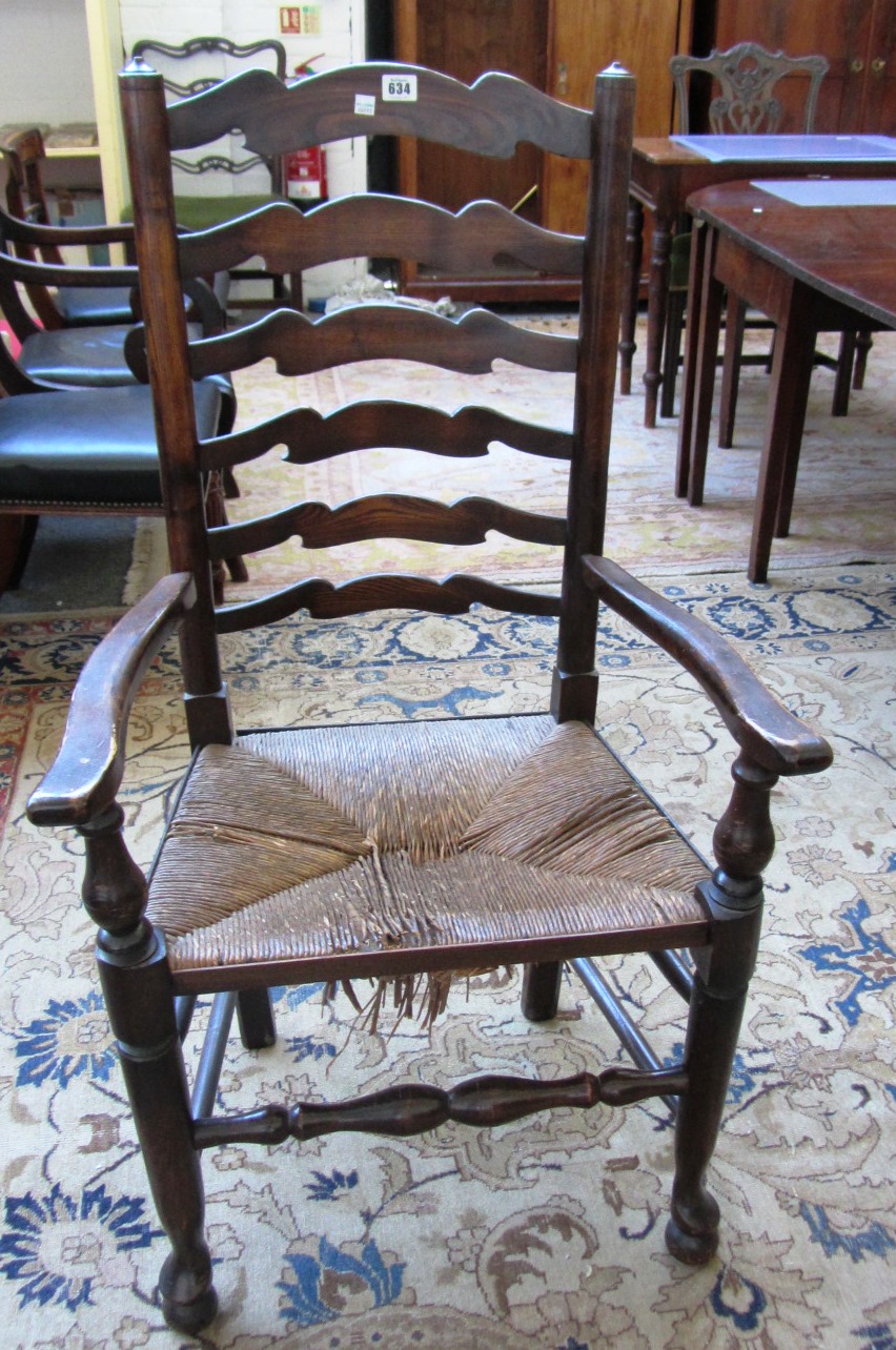 Appraisal: A set of eight ash Lancashire ladder back chairs to