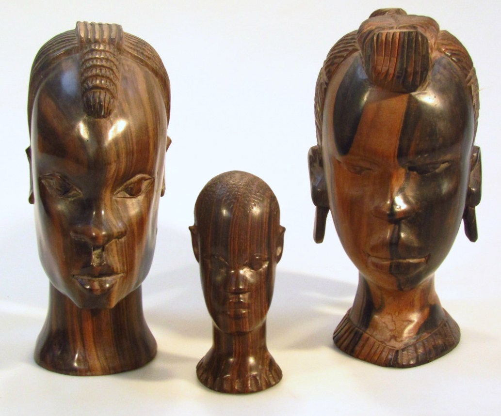 Appraisal: Three various mid- thC African carved hardwood heads to include