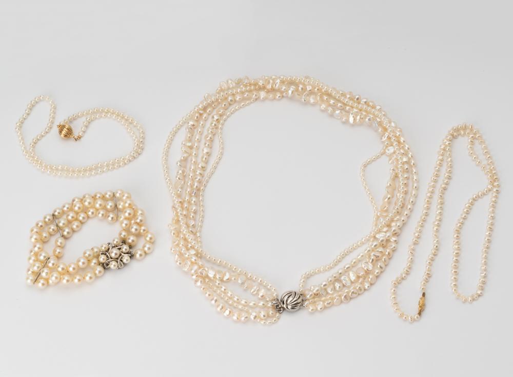 Appraisal: FOUR PEARL JEWELRY ITEMSIncluding a Kt white gold three-strand cultured