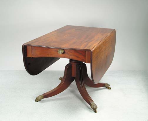 Appraisal: DUNCAN PHYFE MAHOGANY DROP LEAF BREAKFAST TABLE Concave drawer front