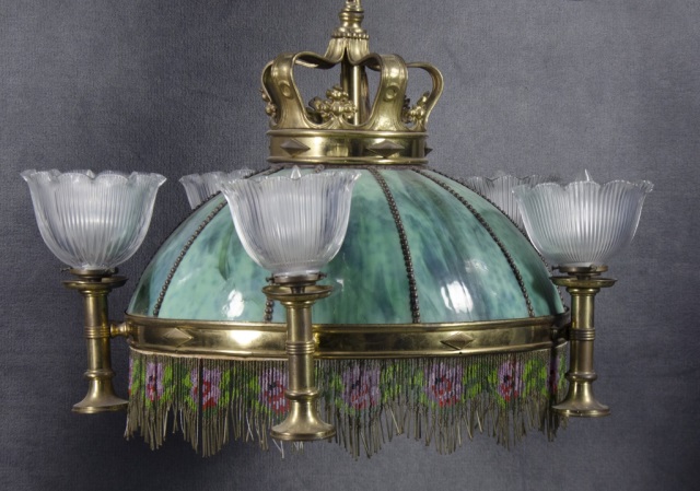 Appraisal: Ornate Brass Slag Glass ChandelierCirca Having aqua-colored slag glass panels