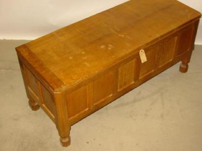 Appraisal: AN OAK PANELLED BLANKET BOX by Robert Mouseman Thompson of