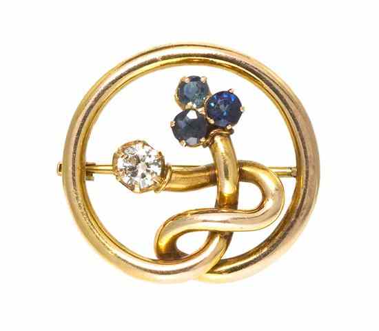 Appraisal: A Yellow Gold Diamond and Sapphire Knot Motif Brooch including