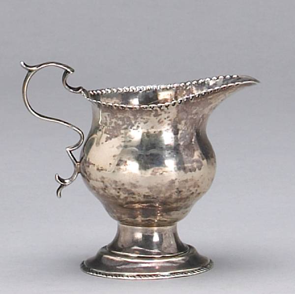 Appraisal: A silver cream pitcherIT struck three times circa - Foliate