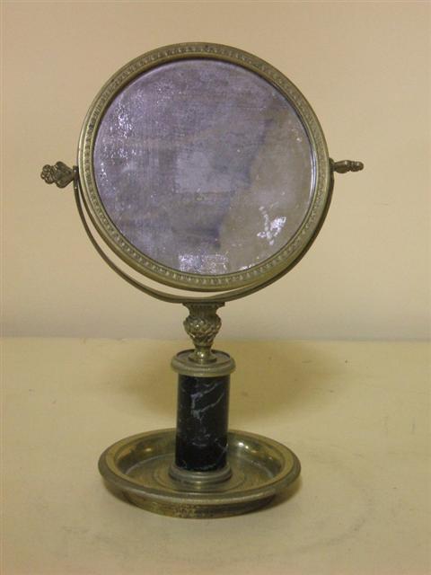 Appraisal: FRENCH EMPIRE STYLE BRASS STANDING MIRROR With circular adjustable double-sided