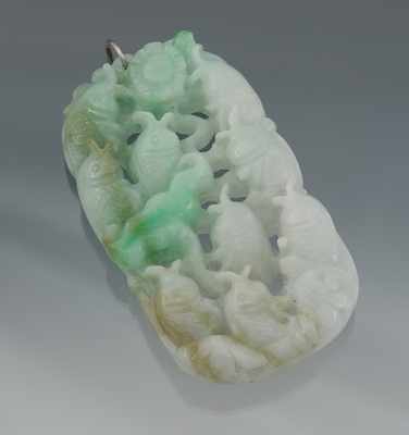 Appraisal: A Chinese Carved Jadeite Pendant Jadeite colors include white green