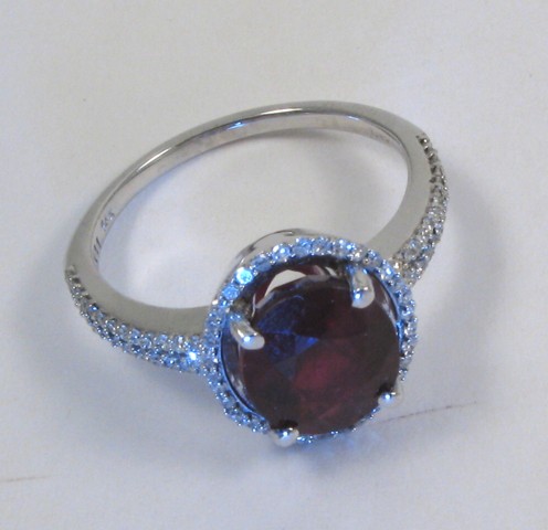 Appraisal: RUBY AND DIAMOND RING WITH APPRAISAL k white gold and