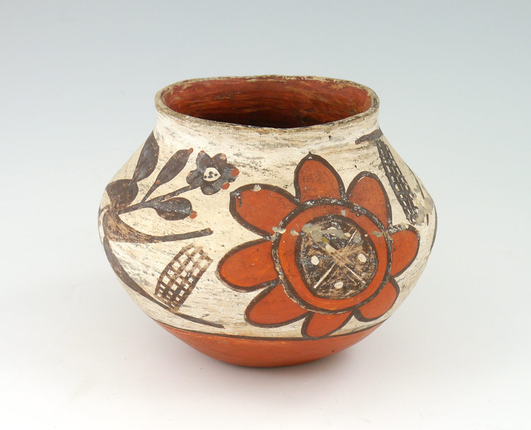 Appraisal: POLYCHROME ACOMA SOUTHWEST POT With floral motifs unsigned old taped