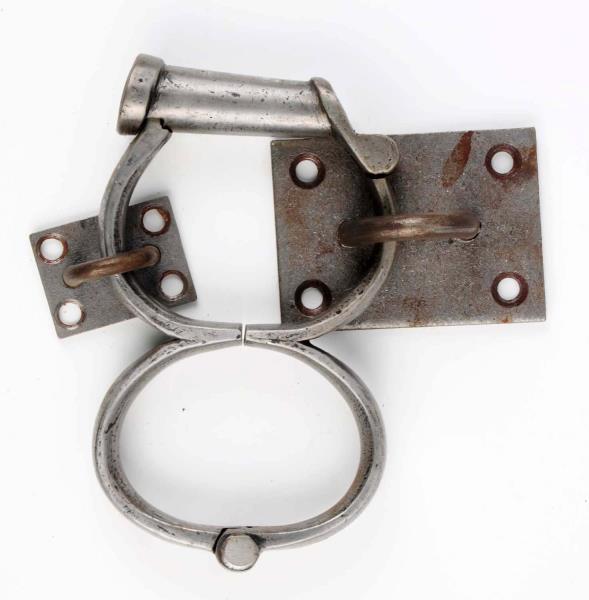 Appraisal: Iris Handcuffs Circa - No key Unmarked Steel finish Size