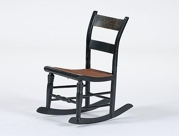 Appraisal: HITCHCOCK ROCKING CHAIR American ca - black paint with original