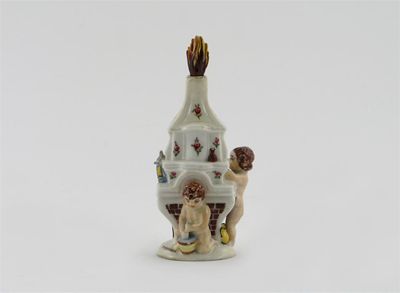 Appraisal: A Girl-in-a-Swing scent bottle modelled as two putti before a