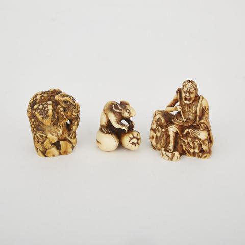 Appraisal: Two Carved Ivory Netsuke and a Carved Ivory Toad Group