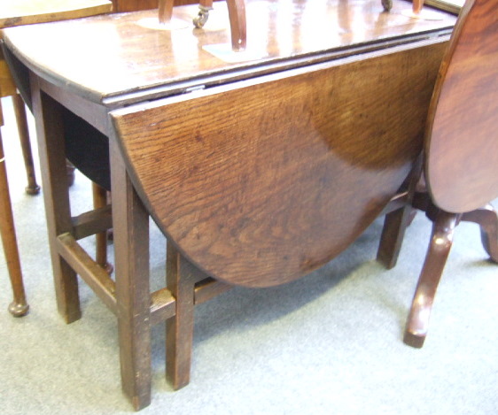 Appraisal: An th century and later oak gate leg table the