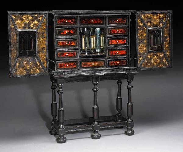 Appraisal: A Flemish Baroque gilt bronze mounted tortoiseshell inlaid ebonized cabinet