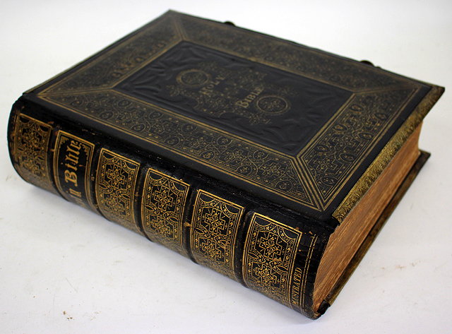 Appraisal: A BROWN SELF INTERPRETING FAMILY BIBLE containing the old and