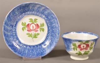 Appraisal: Blue Spatter Adams Rose Pattern Cup Saucer Blue Spatter Adams