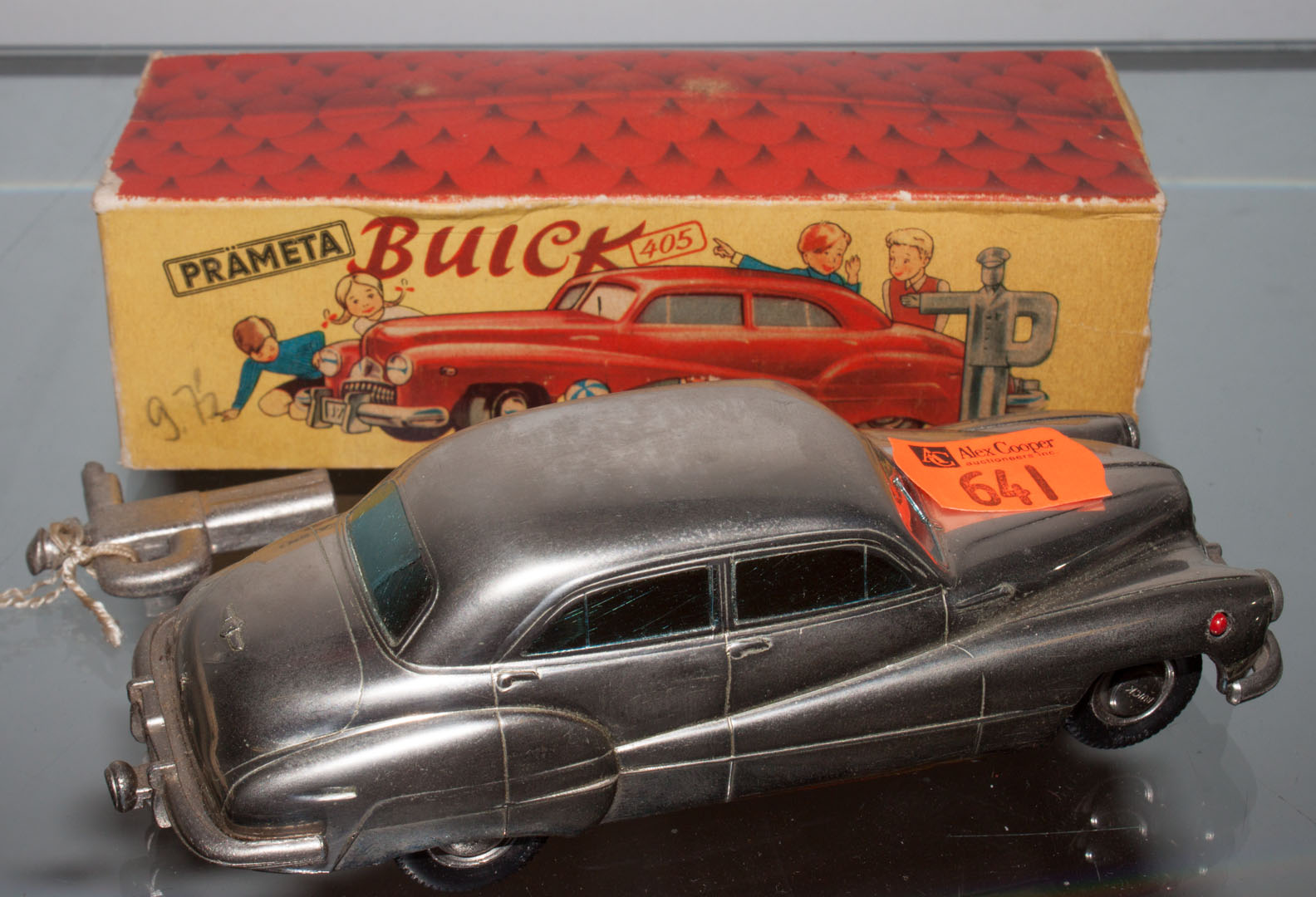 Appraisal: Prameta wind-up Buick circa silver metal wind-up car with traffic