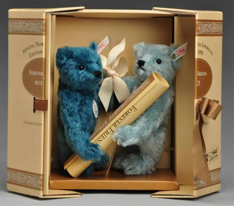 Appraisal: Steiff Forever Friends Set Description Two turquoise teddy bear set